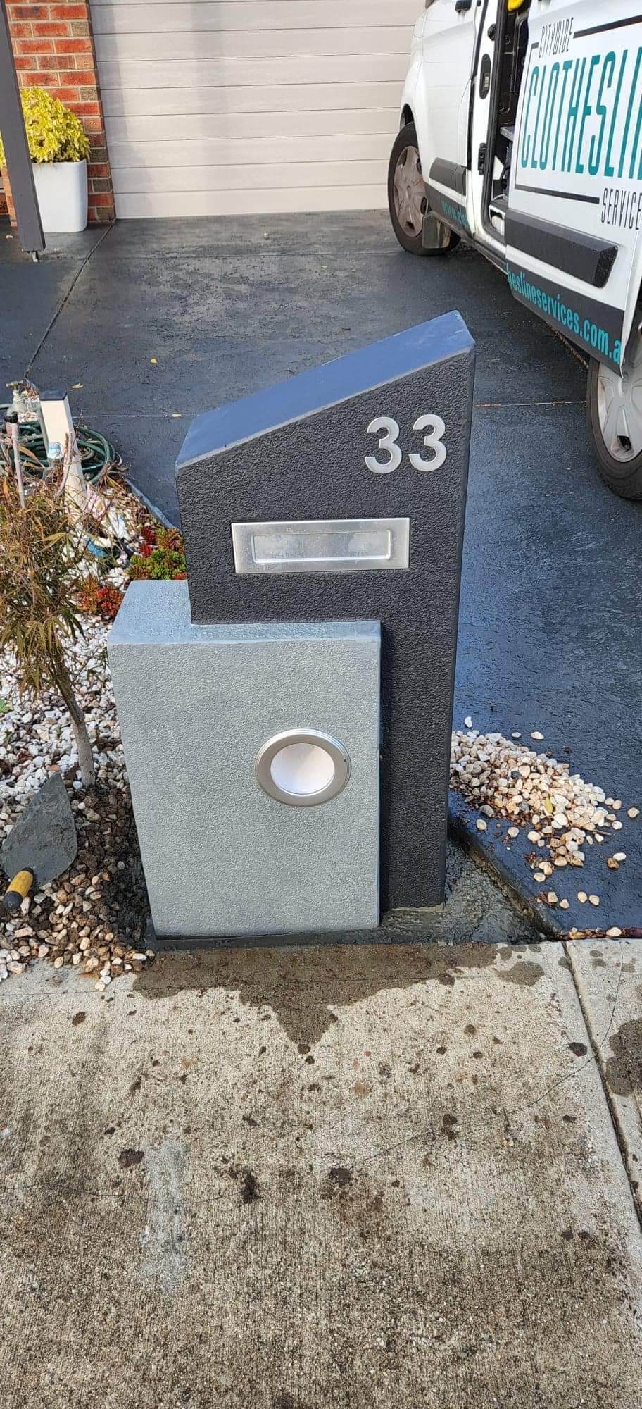 freestanding concrete letterbox installation in Camberwell, Melbourne onto new concrete slab.